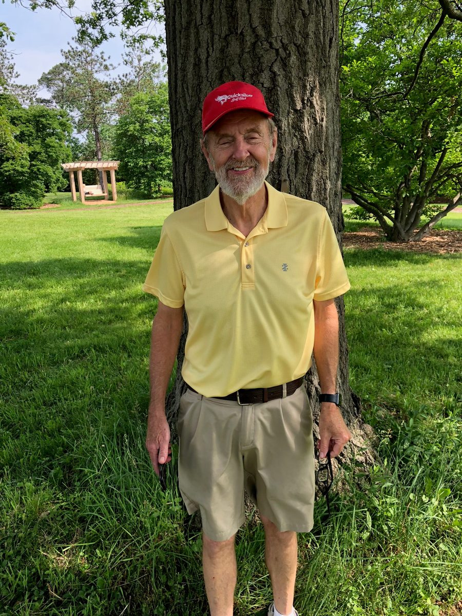 Tom Eliseuson standing in front of a large tree